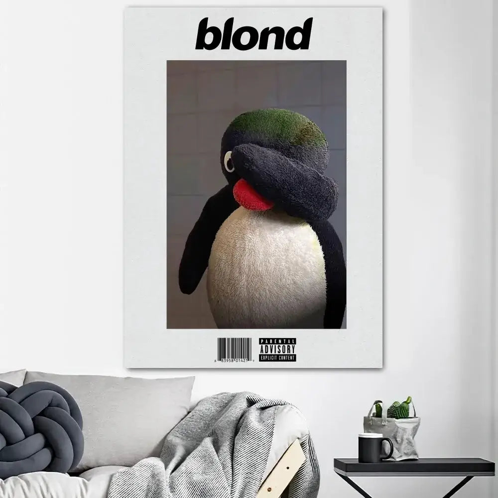 A plush pingu toy with black white fur green feathers red beak and gray scarf styled as a magazine cover for home decor oceans poster prints