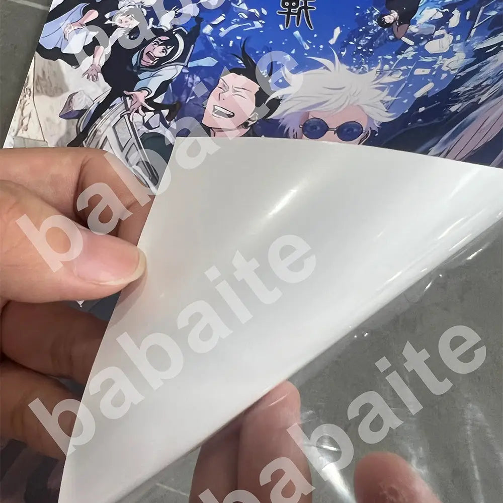 White protective film being peeled from a jujutsu kaisen poster print from decorbites™ blonde ocean poster prints for home decor