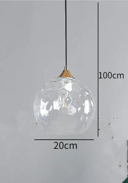 Blue and amber decorbites glass ball pendant with textured bubble surface and brass ball pendant led fixture for kitchen decor