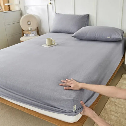Gray textured fitted sheet with subtle ribbed pattern and elasticized edges for decorbites coarse cotton queen bed