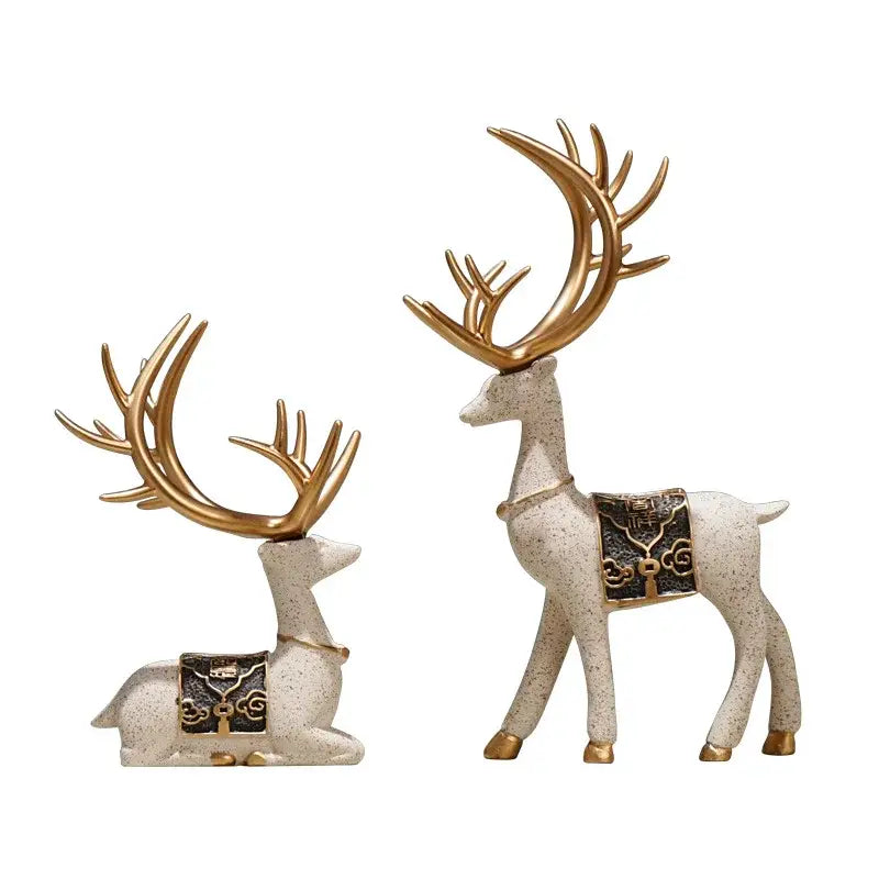 Two resin elk reindeer decorbites deer figurine set with speckled off-white bodies gold antlers for living room decor