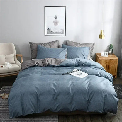 Blue and gray grain pattern duvet cover set with blue denim-like fabric and matching pillows with a gray accent pillow