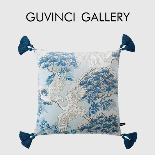 Blue and white crane throw pillow case with pine tree pattern and deep teal tassels for living room decor
