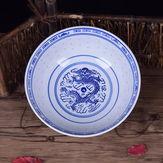 White ceramic ramen bowl with intricate blue dragon pattern and yin-yang decorbites dragon pattern porcelain design