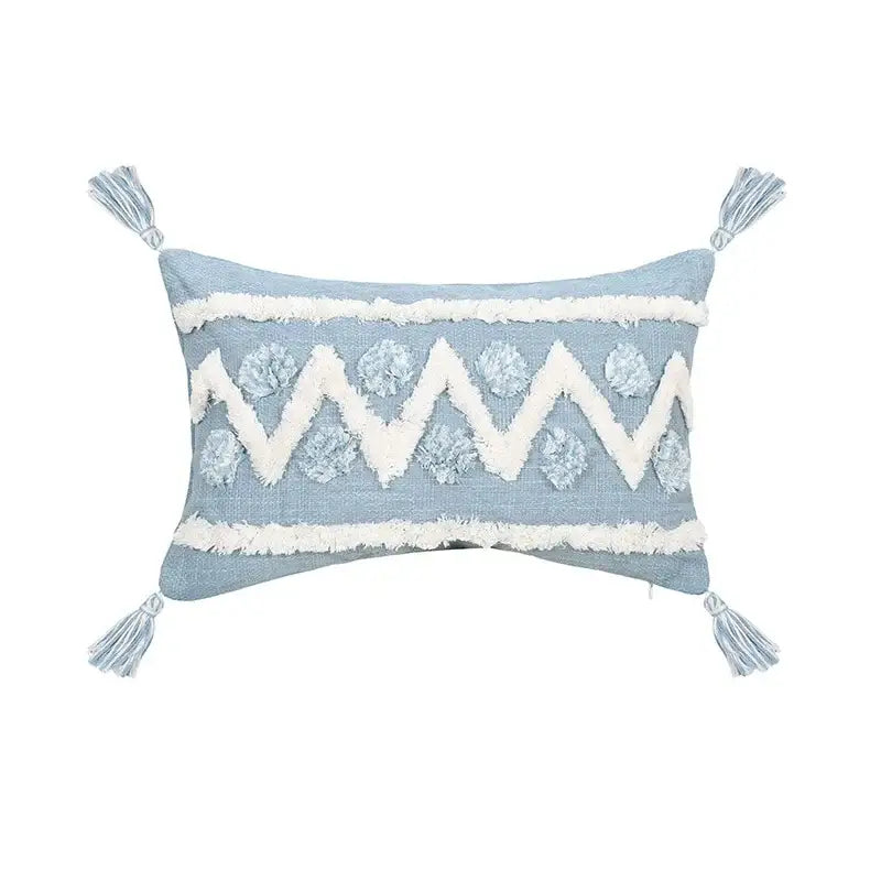 Light blue rectangular pillow with white zigzag pom-pom embroidery and tassels from decorbites blue geometric tufted pillowcase set