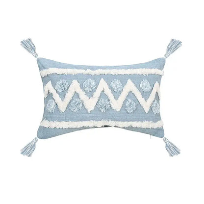 Light blue rectangular pillow with white zigzag pom-pom embroidery and tassels from decorbites blue geometric tufted pillowcase set