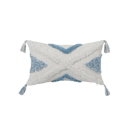 Rectangular white and light blue textured throw pillow with woven geometric pattern and tassels in blue geometric tufted pillowcase set