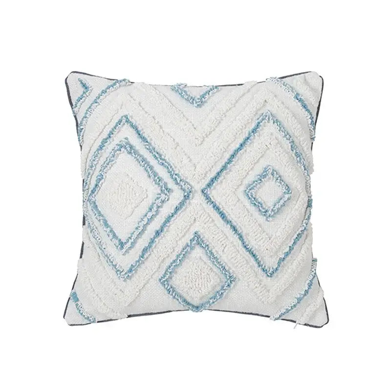 White throw pillow with textured light blue geometric embroidery from decorbites blue geometric tufted pillowcase set
