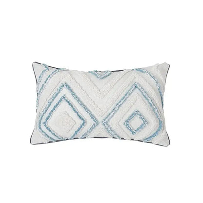White rectangular pillow with blue geometric tufted patterns and cream textured frayed edges from decorbites pillowcase set