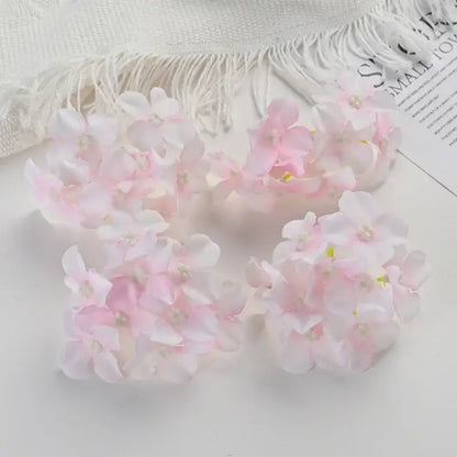Delicate clusters of artificial pink and white hydrangea flowers with subtle yellow centers for decorbites hydrangea flowers wedding decor