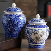 Blue and white porcelain general jar tea canister with intricate floral and bamboo designs and matching lids