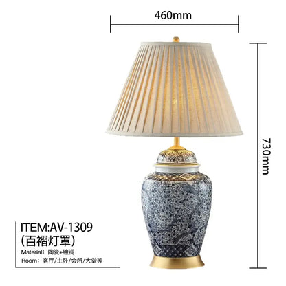 Elegant blue and white decorbites blue porcelain table lamp with gold accents and a pleated off-white fabric shade for living room decor