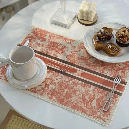 Rectangular cotton linen place mat with rust orange vintage toile pattern, bold stripes, and frayed edges for dining decorbites decor