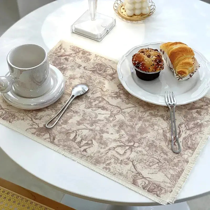Beige cotton linen place mat with vintage brown animal print and frayed edges from decorbites kitchen dining decorbites cotton linen place