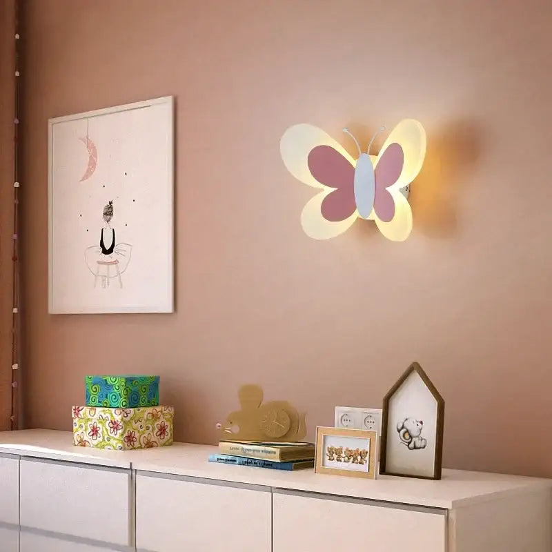 Pastel pink and cream butterfly girl cartoon wall sconce with soft glowing light for cartoon children room bedroom
