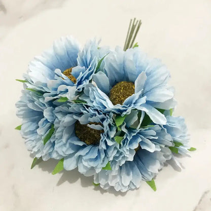 A delicate decorbites blue flower cherry stamen berries bundle with light blue petals and textured golden centers for decor