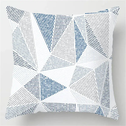 Square throw pillow with blue geometric marble pattern of interlocking triangles in blue gray and white for living room decorbites decor