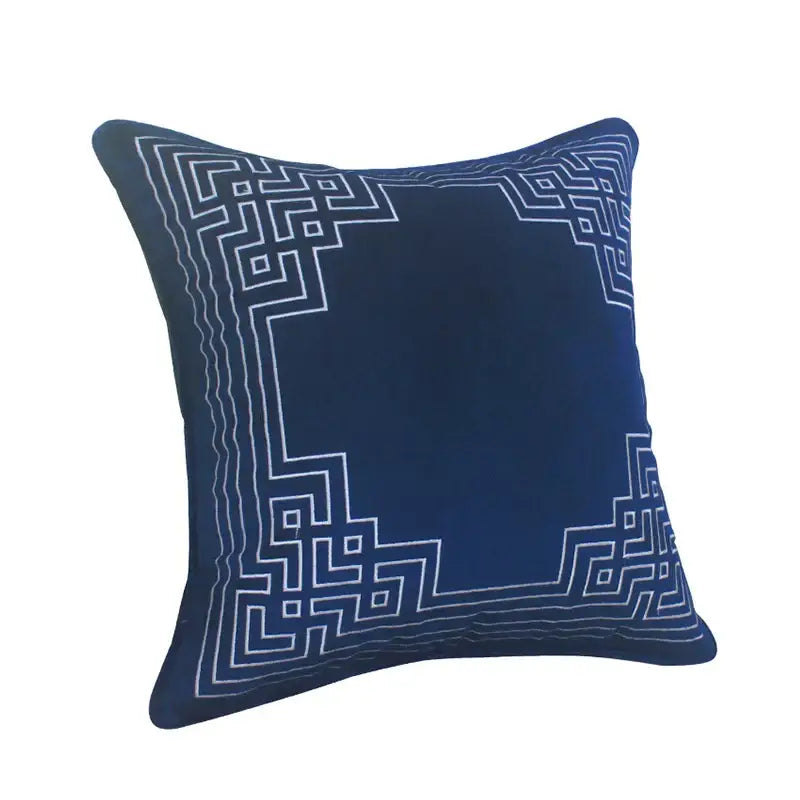 Blue geometry embroidery cushion featuring deep blue dutch velvet shell with intricate white geometric decorbites blue geometry design