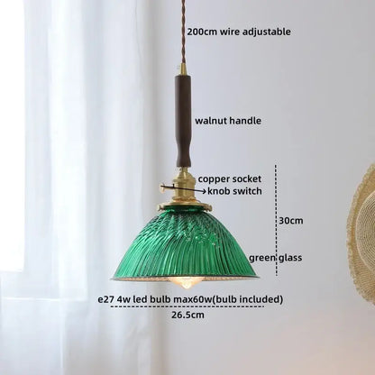 Green ribbed glass pendant lamp with walnut handle and copper socket complementing decorbites blue glass led design