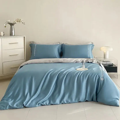 Blue and gray cotton solid bedding set with blue satin duvet cover and embroidered decorbites cotton solid pillowcases
