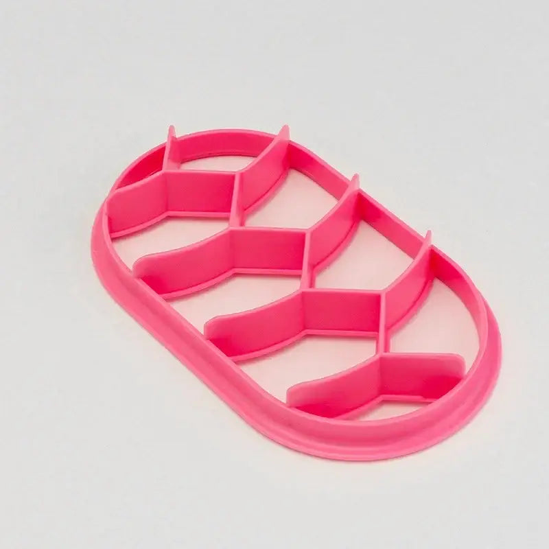 Bright pink plastic cookie cutter shaped like a pineapple for use with blue honeycomb and star circular oval bread molds baking tool
