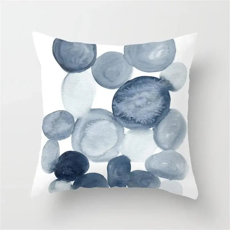 A square throw pillow with a blue ink flower watercolor design in blue and gray for living room decorbites decor