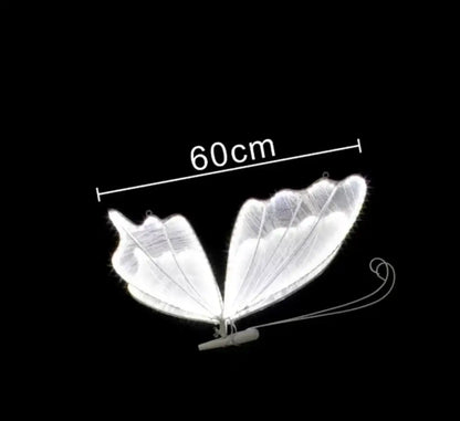 A glowing white butterfly-shaped blue lace led decorative light fixture 60cm wide for wedding or bedroom decorbites blue lace