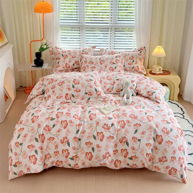 Pink floral bedding set with soft peach and green blossoms on white background featuring decorbites cotton stripe comforter cover