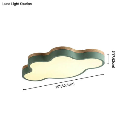 Blue and natural wood cloud flush mount ceiling lamp with matte sage green body and warm light for kids bedroom