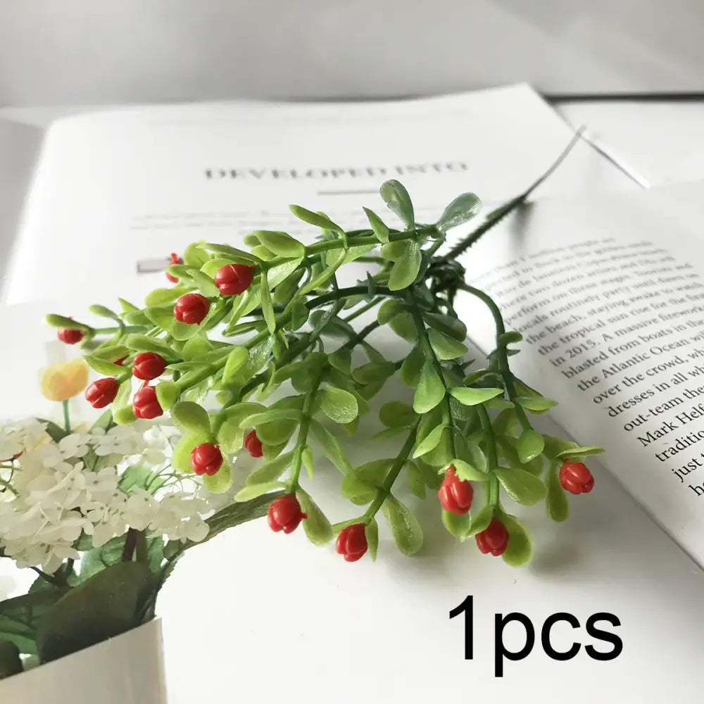 A vibrant artificial green sprig with glossy red berries complements blue peony and tea rose silk fake flowers