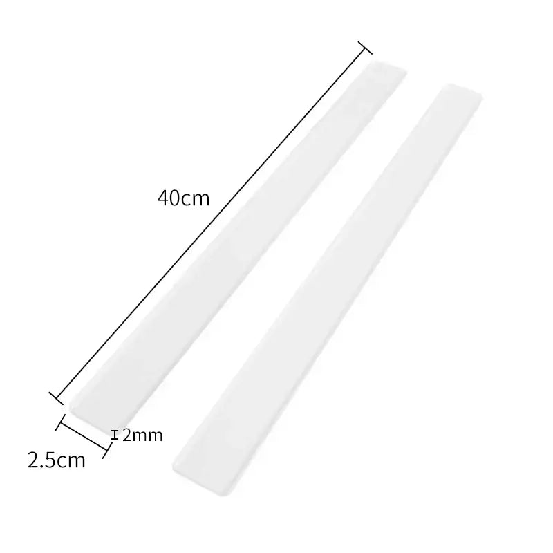 Two translucent white adhesive strips measuring 40cm by 2.5cm for use with a blue silicone rolling balance ruler