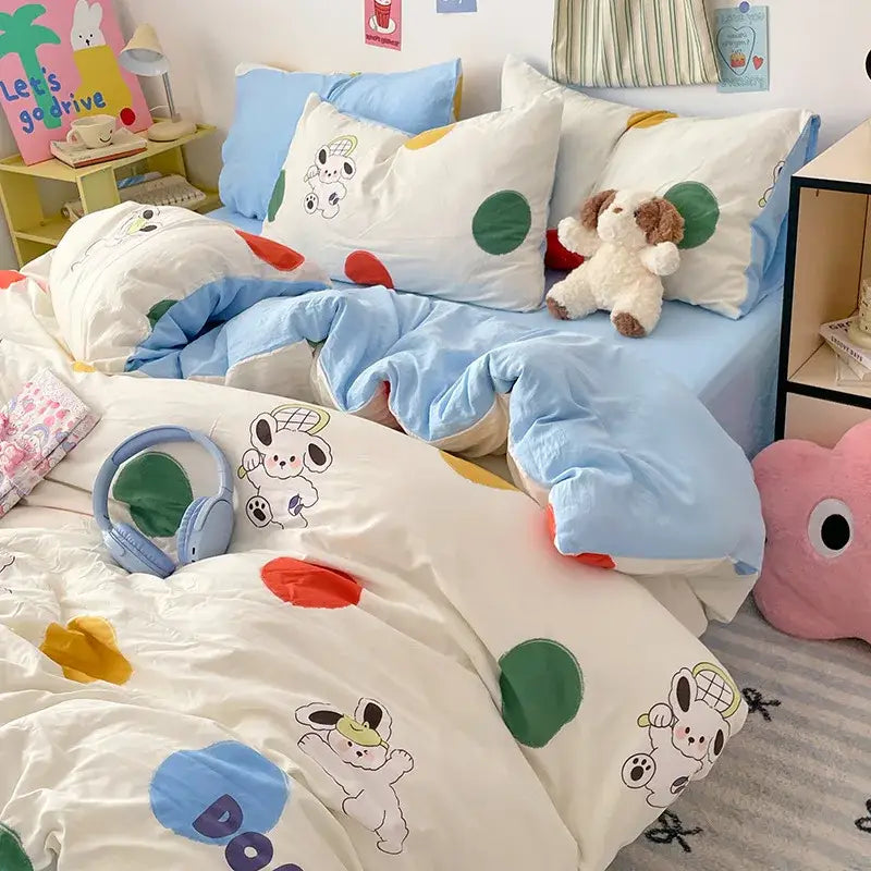 White duvet cover with playful cartoon dogs and colorful polka dots in blue and green from decorbites cloud cotton bedding sets