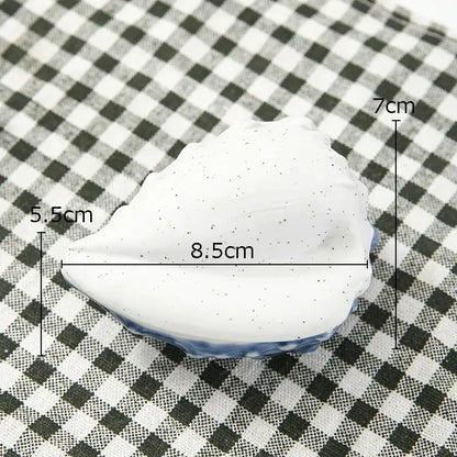 White ceramic marine life clamshell tray with speckled glaze and blue rim decorbites ceramic marine bedroom decor