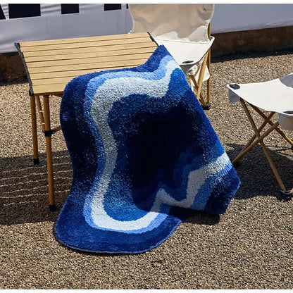 Plush decorbites cloud shaped tufted rug bath mat in blue and white gradient with non slip backing and wavy design