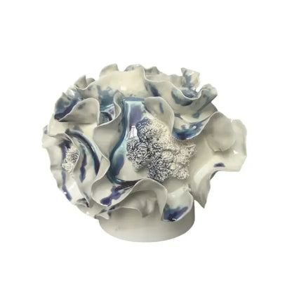 Blue and white handmade porcelain fold pattern vase with ruffled layers and silver floral decorbites handmade porcelain fold decor