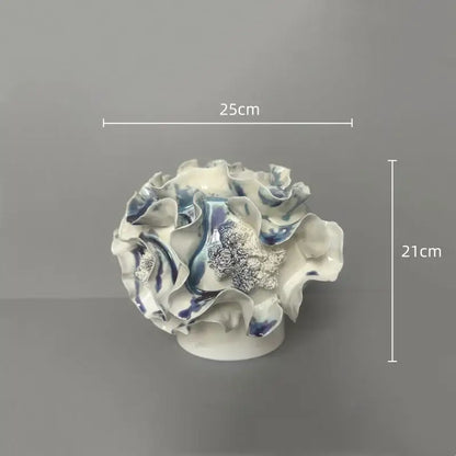 Delicate blue and white handmade porcelain fold pattern vase with ruffled layers and silver-leaf floral decorbites handmade porcelain fold decor