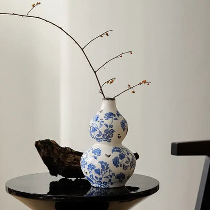 Blue and white porcelain gourd teapot vase with delicate floral patterns for living room decor