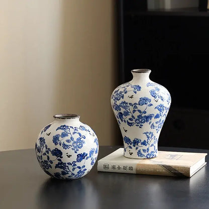 Two white porcelain gourd vases with blue floral patterns including a porcelain gourd teapot vase for living room decor