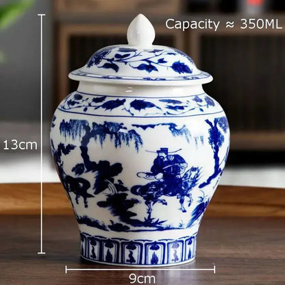 White porcelain tea canister with blue underglaze painting of a rider on horseback and matching lid with finial