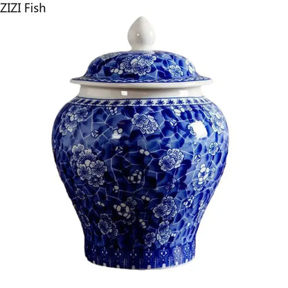 Blue and white white porcelain tea canister with intricate floral mosaic pattern and matching lid for kitchen storage