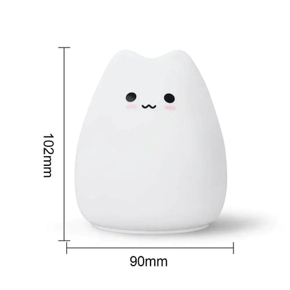 A soft white cat silicone touch night light with black eyes and a smiling face for bedroom decorbites cat silicone lamp