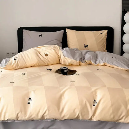 Beige and gray checkered duvet cover set with black cat and coffee pot motifs for bedroom use