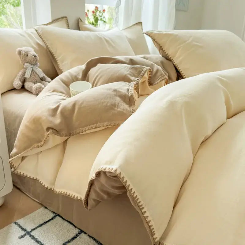 Cream-colored cotton duvet set with subtle zigzag trim from blush pink and gray cotton edge embroidery bedding set