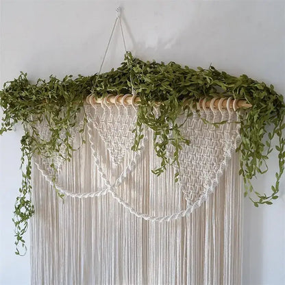 Cream-colored bohemia macrame cotton curtain with vines hanging on wooden rod for bedroom decorbites bohemia macrame