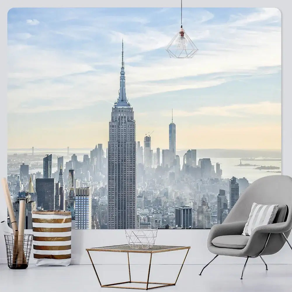 Gray modern armchair with striped pillow paired with decorbites bohemian art tapestry empire state cityscape blanket
