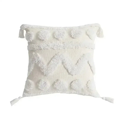 Cream-colored textured throw pillow with fluffy pom-poms and tassels bohemian tufted tassel cushion cover decorbites bohemian tufted