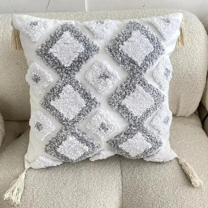 Bohemian beige and brown tufted cushion cover with white and gray diamond texture and cream bohemian tufted tassel decorbites pillow