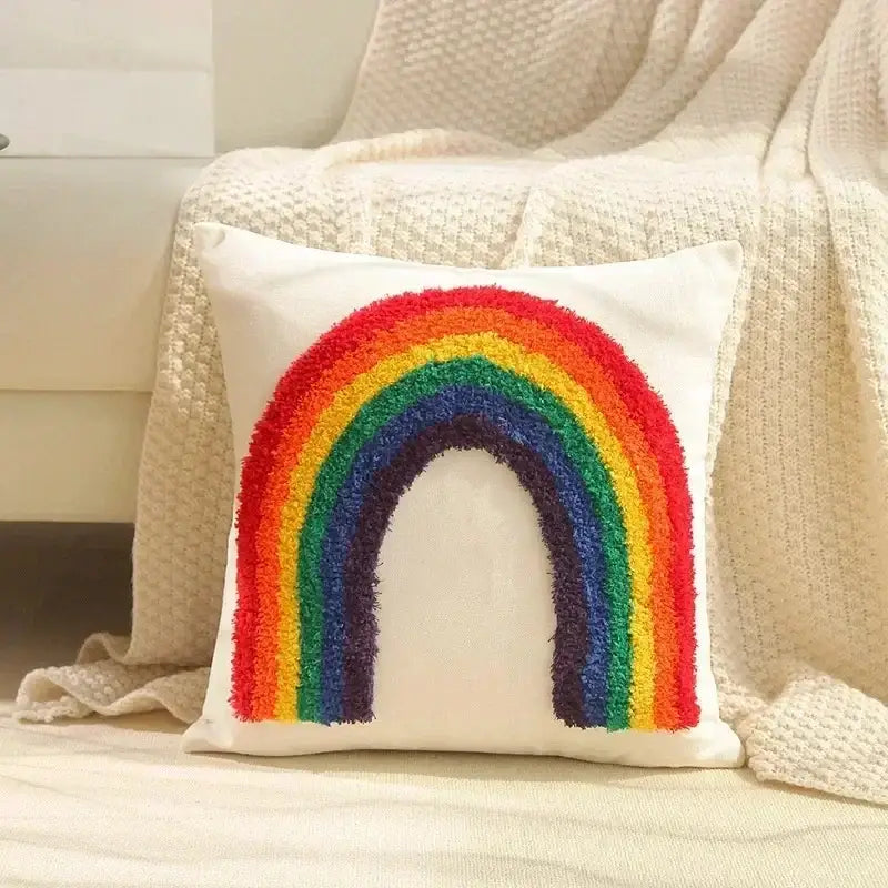 Cozy white cushion cover with vibrant textured rainbow design in classic colors for decorbites bohemian tufted living room decor