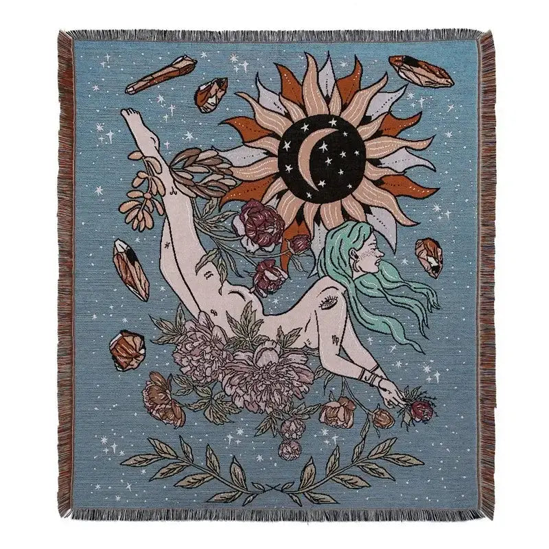 Bohemian camping blanket by decorbites featuring a woven celestial tapestry with sun-moon motif on soft blue background