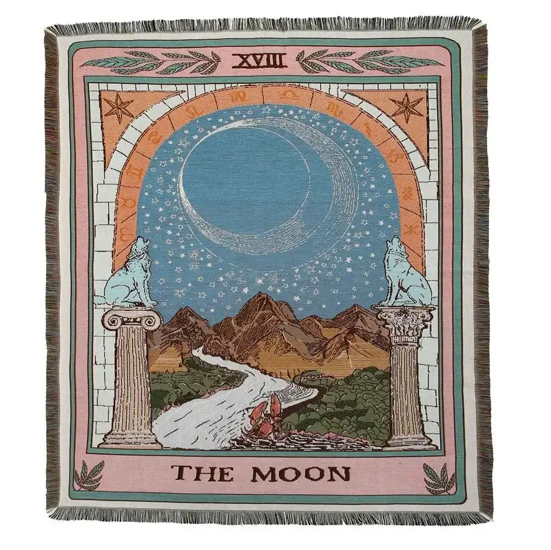 Woven bohemian camping blanket by decorbites featuring the moon tarot card with blue crescent moon and wolves design